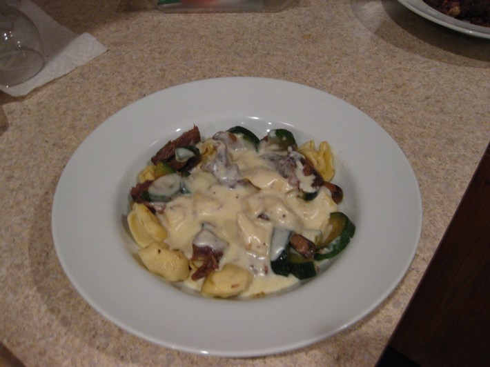 Tortellini with ribs and zucchini